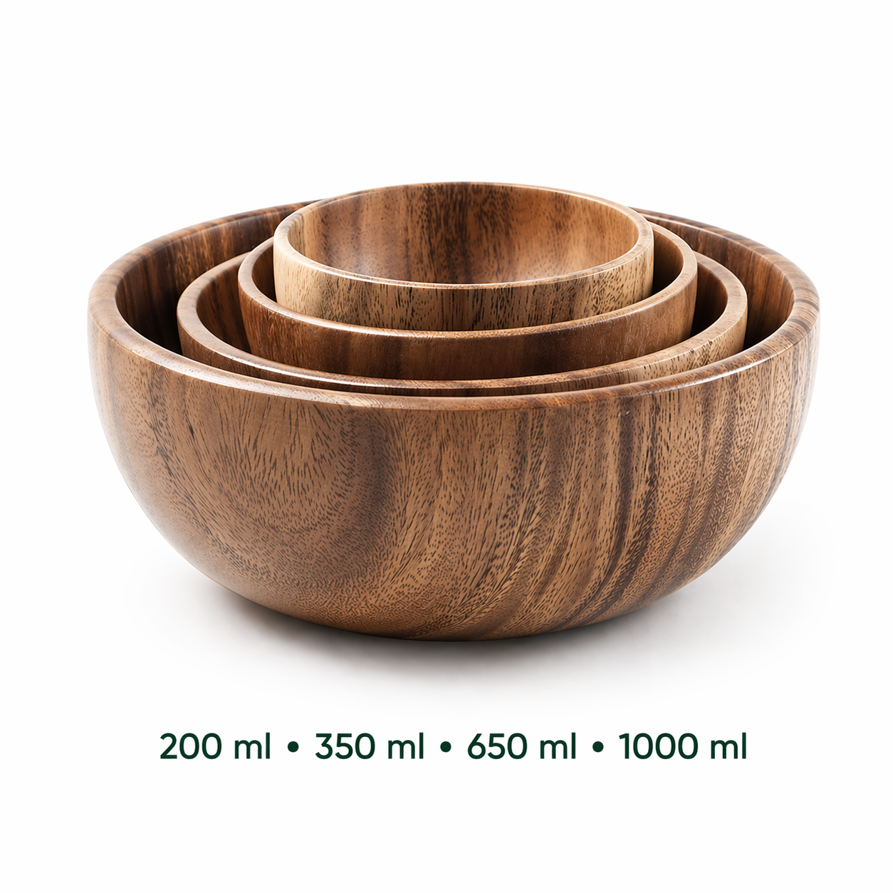 Set of three wooden bowls with varying capacities on a white background