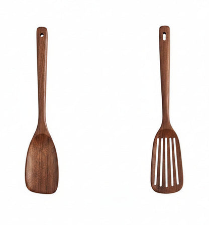 Two wooden spatulas with measurements and weights on a white background
