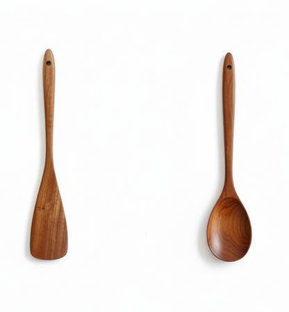 Two wooden paddles with measurements on a white background