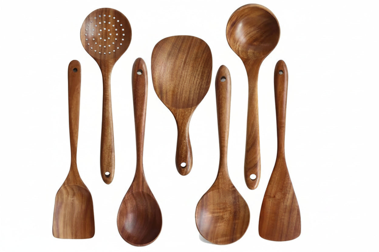 Set of seven wooden spoons with numbers indicating their order on a white background.