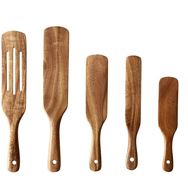 Set of wooden spatulas with measurements on a white background