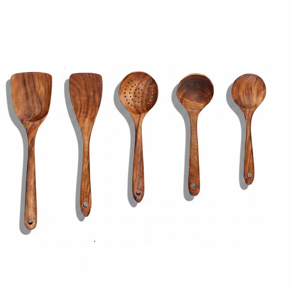 Wooden cooking utensils with measurements on a white background