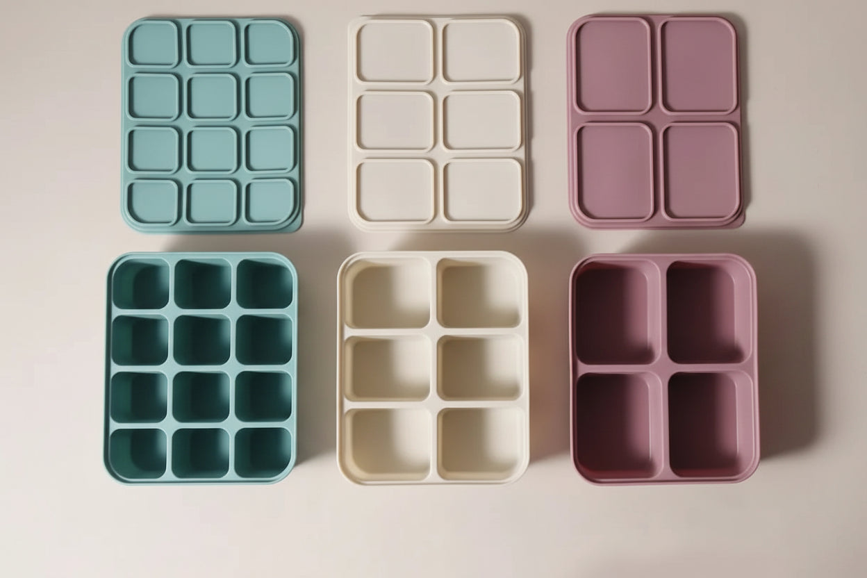 Set of silicone compartment molds with measurements on a neutral background