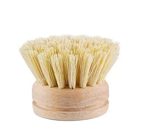 Sisal bristle brush head with wooden handle on a white background