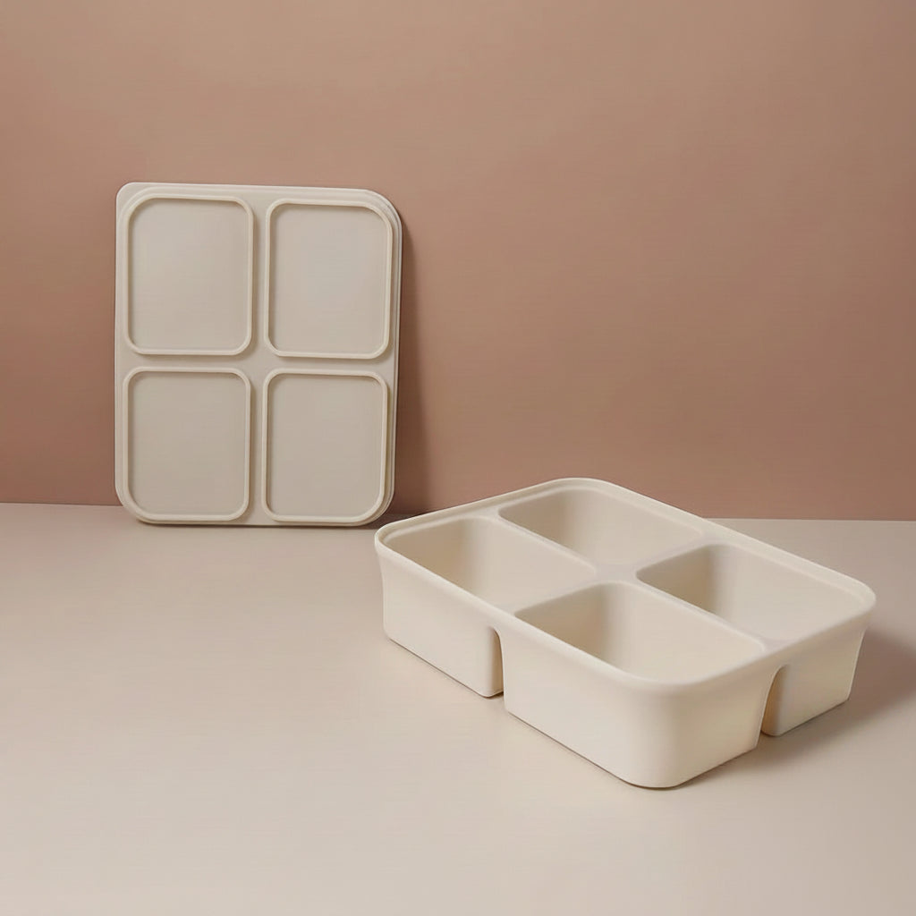 Beige divided ice trays with measurements on a beige background